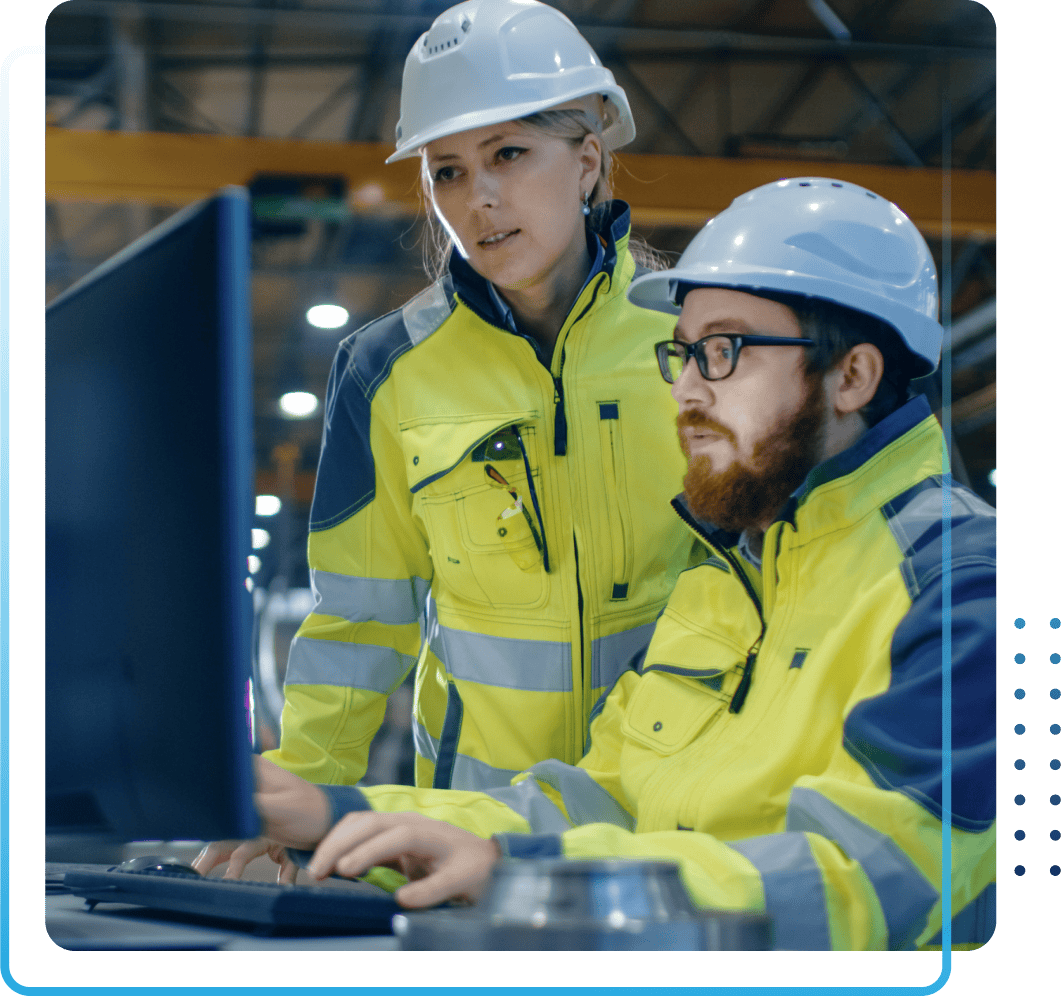 Young african american woman working on a computer and taking notes
